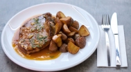 Confit pork chops with garlic, roasted potatoes