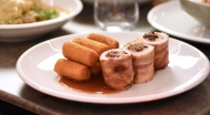 Turkey breast roulade stuffed with chestnuts and prunes, croquettes, juss