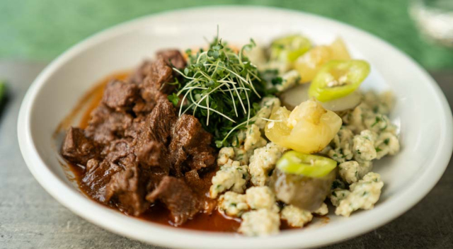 Lamb stew with wild garlic dumplings and homemade pickles