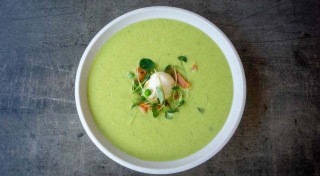 Green pea cream soup with smoked salmon and cream cheese 