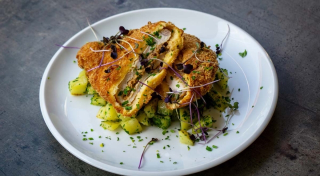 Pork loin stuffed with brain, parsley potatoes 